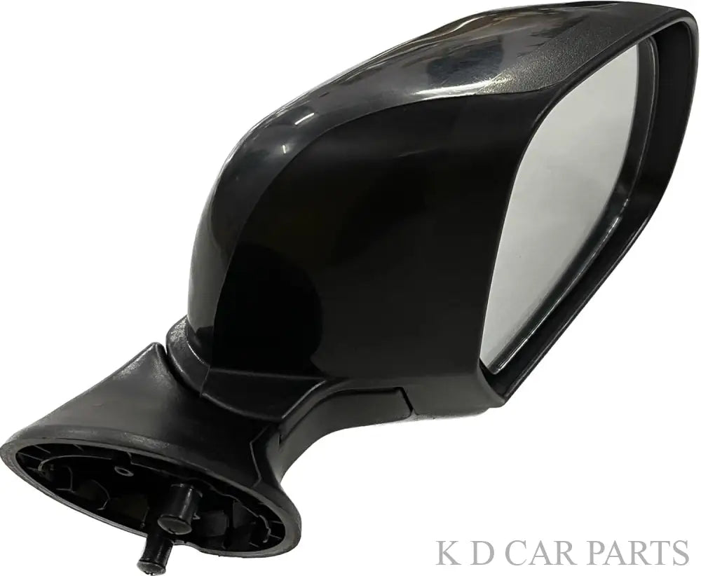 A black, clear K D side/door mirror for Renault Duster/Verito/Terrano non-adjustable models.