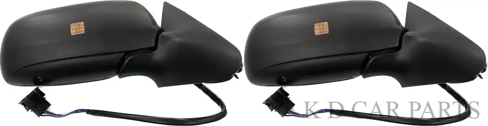 A pair of black side mirrors for a Skoda Octavia car, with wiring and couplers visible.