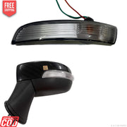 The image shows two K D brand side mirror indicators for a Ford Ecosport. The upper mirror is shown in a silver housing with a clear glass lens, and the lower mirror has a black housing with a white and clear lens assembly.