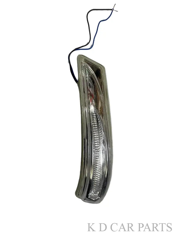 A K D brand side/door mirror indicator for c, featuring a yellow lens and black housing, shown from the front and a close-up of the mounting area.