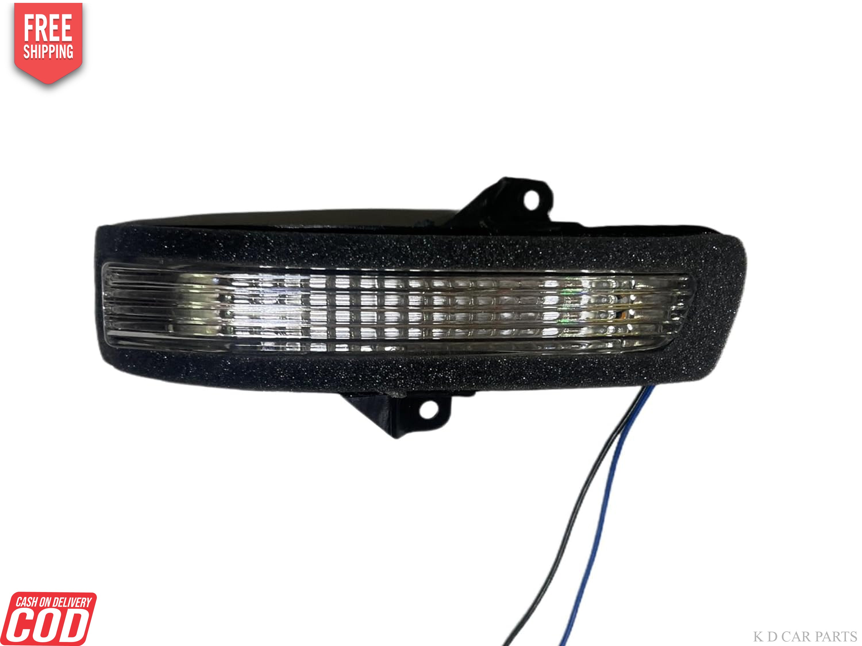 A K D brand side/door mirror indicator for Maruti vehicles, featuring a yellow-colored lens with a convex design.