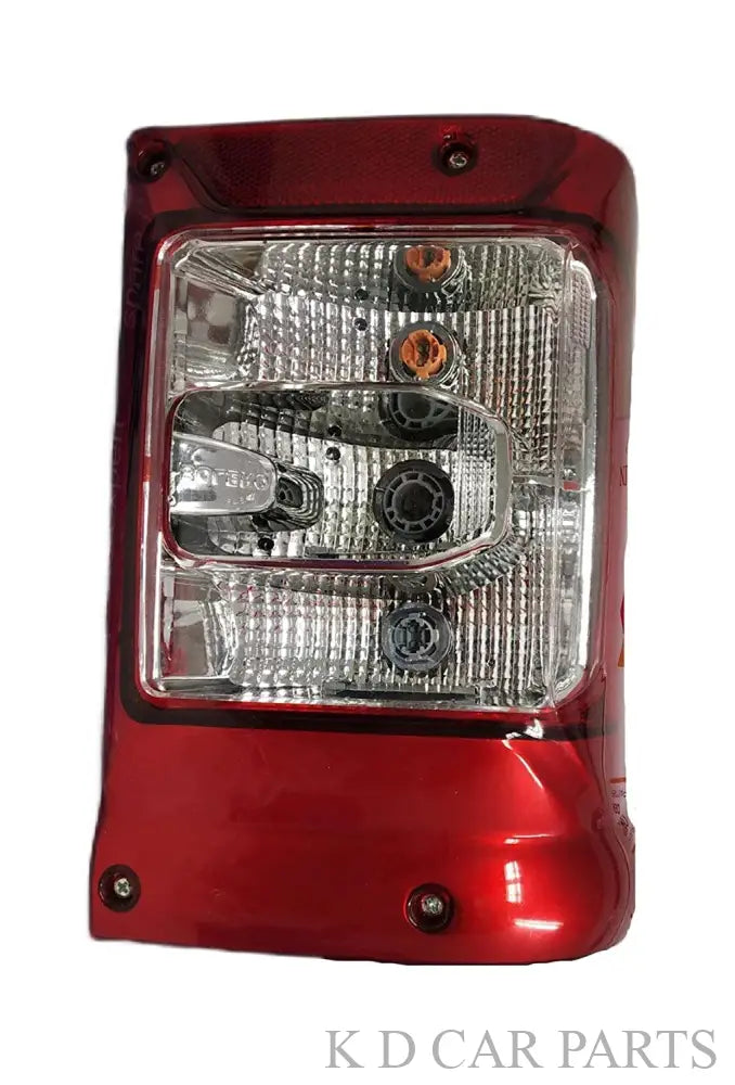 Red tail light assembly for Mahindra Bolero Type 4 featuring brake lights, with a clear lens and reflector design.