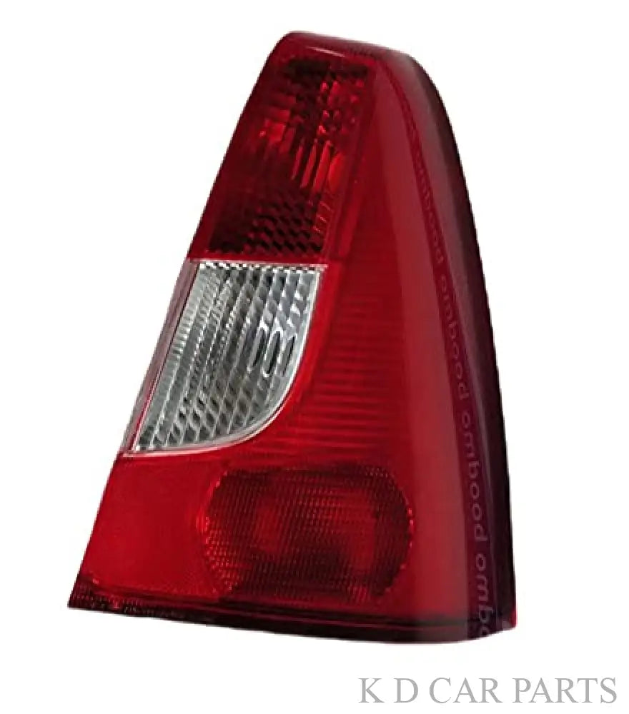 Red tail light assembly for a vehicle, featuring a clear lens and a red-colored housing.