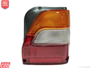 Tail light assembly for Maruti 800 Type 2 with clear lens and red, yellow, and white coloration.