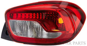 Red tail light assembly for Renault Kwid 2015-2019 with halogen bulb.