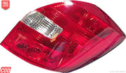 Red tail light assembly for Skoda Fabia 2008-2013, featuring clear glass and a chrome-colored lens.
