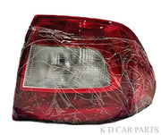 Red tail light assembly for Skoda Rapid (2011-2016) wrapped in plastic, with a clear lens and a red-tinted cover.