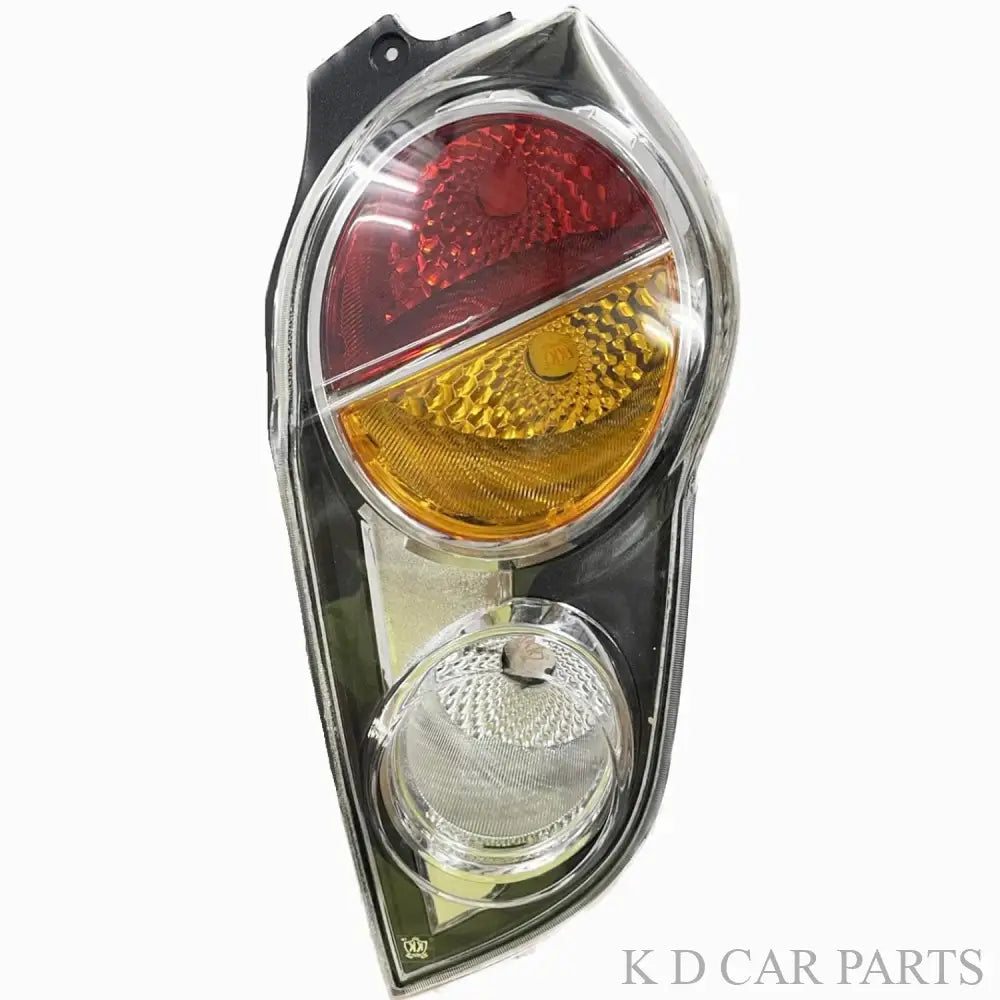 Rear tail light for Chevrolet Beat model years 2010-2014, featuring a white light with a red lens and yellow reflector.
