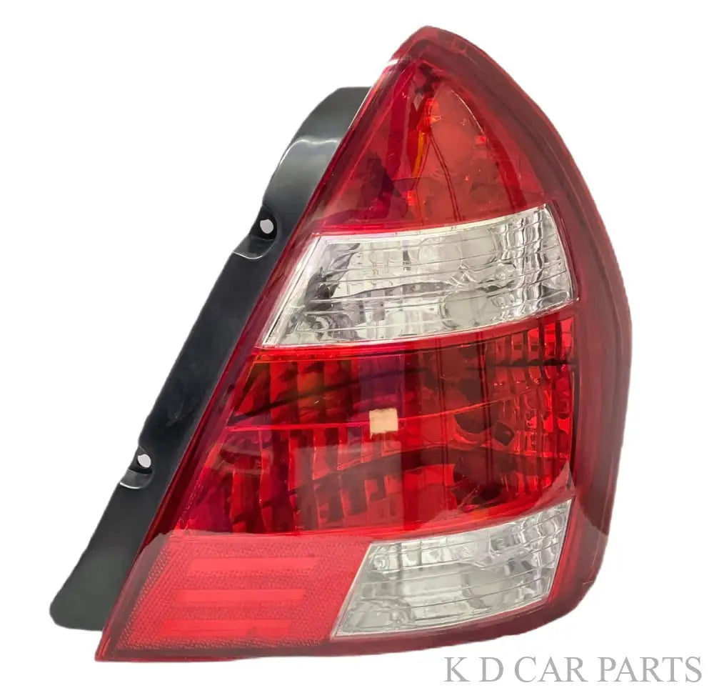 Red tail light for Tata Indigo Type 1 vehicle (2002-2011) with a black border and clear glass.