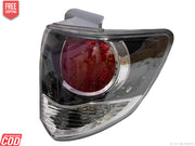 Black tail light for Toyota Fortuner Old Model, featuring a clear glass and red-colored reflector.