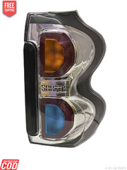 Rear tail light for Mahindra Scorpio S10 with blue and orange colored lenses.