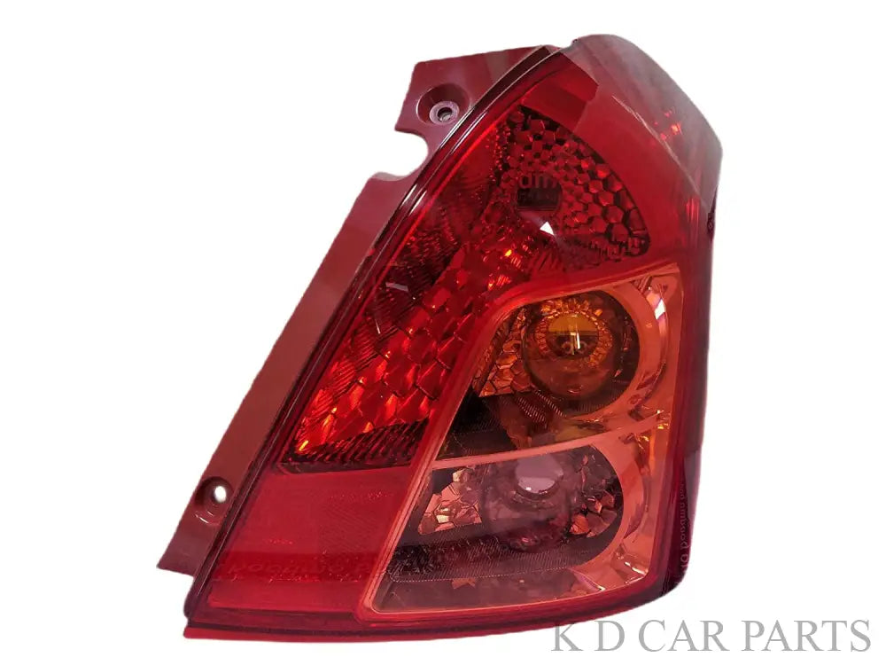 Red tail light for Maruti Suzuki Swift 2005-2011 with clear lens and visible internal components.