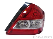 Rear tail light for a Suzuki Dzire 2012-2017, featuring a red cover with clear and silver components visible behind.