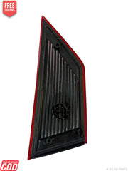 Black car side mirror cover with red trim on a white background