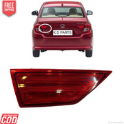 Red car with a close-up of a red tail light on a white background, featuring 'K D Parts' branding.