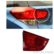 Car tail light assembly with close-up of brand name on a white background