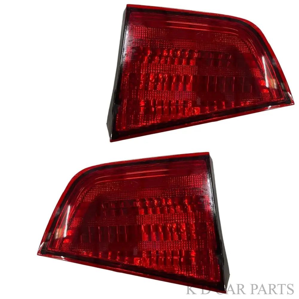 A pair of red tail light assemblies for the Honda Mobilio 2014-2017 model years.