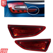 Pair of red taillight assemblies for Maruti Baleno, displayed against a white background.