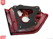 Red and black mechanical component on a white background