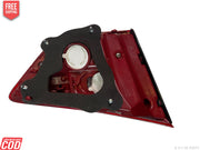 Red and black electronic component on a white background
