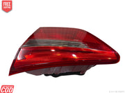 Red car tail light on a white background