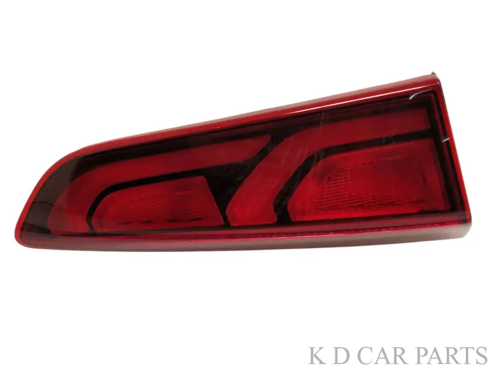 Red tail light assembly for Hyundai I20 with clear lens and red-colored borders.