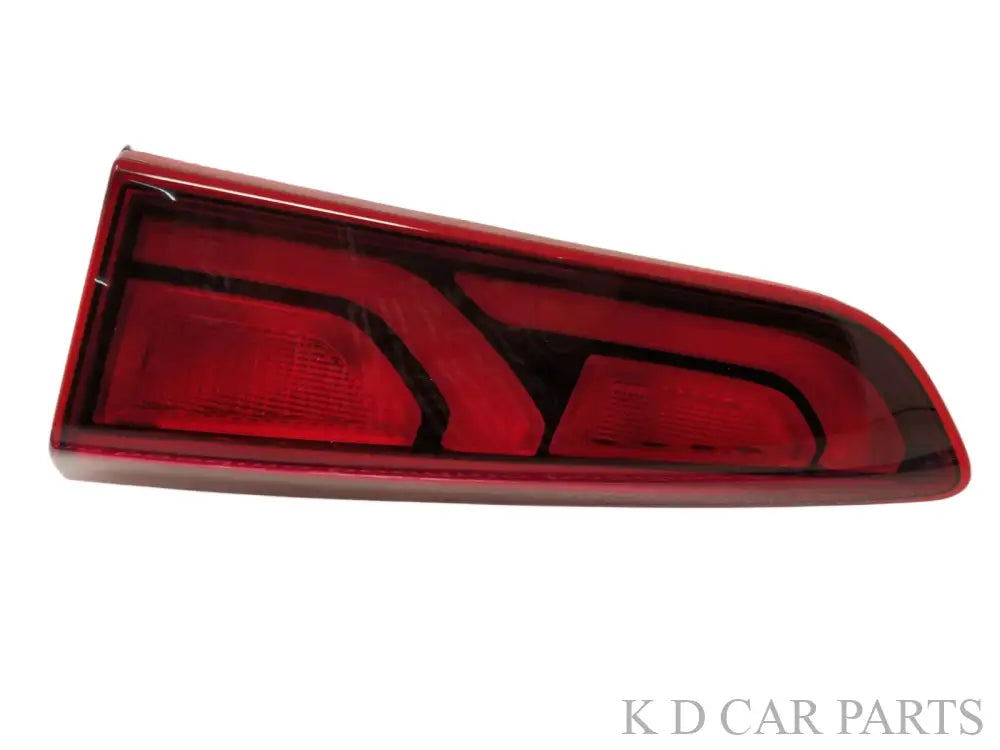 Red tail light assembly for Hyundai I20 with clear lens and red-colored borders.
